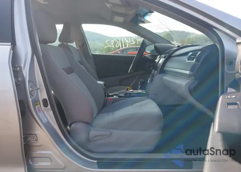 2012 Toyota Camry Le z USA, uszkodzony, nr VIN 4T4BF1FK7CR214004